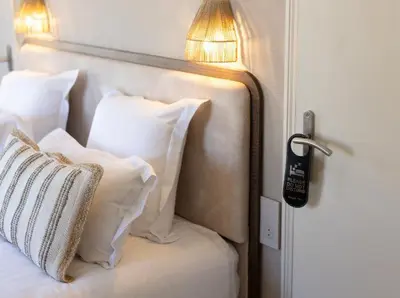 Un ou plusieurs lits dans un hébergement de l'établissement Hôtel Lou Juan