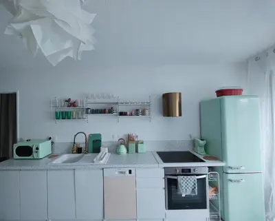 Cuisine ou kitchenette dans l'établissement Beau T3 au calme près gare, mer et centre ville