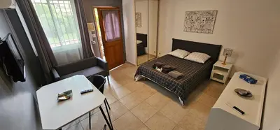 Un ou plusieurs lits dans un hébergement de l'établissement Très grand studio meublé - Juan les Pins - Logt4