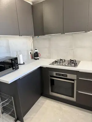 Cuisine ou kitchenette dans l'établissement Le Prestigieux - plage