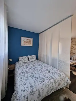 Un ou plusieurs lits dans un hébergement de l'établissement Bright apartment 10 minutes from Cannes