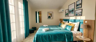 Un ou plusieurs lits dans un hébergement de l'établissement Villa Olimp in Super Cannes with sea view