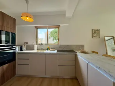 Cuisine ou kitchenette dans l'établissement Le Cirodde SCLS - Climatisation, Wifi, Parking