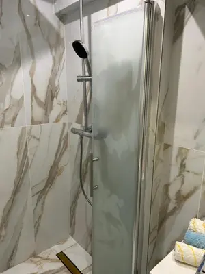 Salle de bains dans l'établissement Normandy