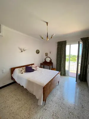 Un ou plusieurs lits dans un hébergement de l'établissement Appartement dans Villa à Antibes avec Vue Mer