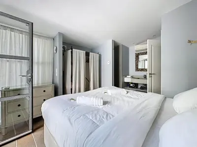 Un ou plusieurs lits dans un hébergement de l'établissement 126m2 - maison plage, 3 chambres, 3 salles de bain