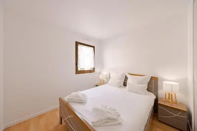 Un ou plusieurs lits dans un hébergement de l'établissement Cannes 2 bedrooms apartment - 141A