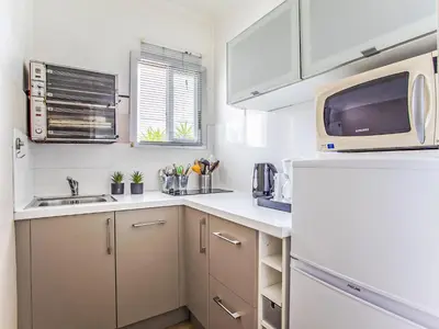 Cuisine ou kitchenette dans l'établissement Studio Le St Cloud by Interhome