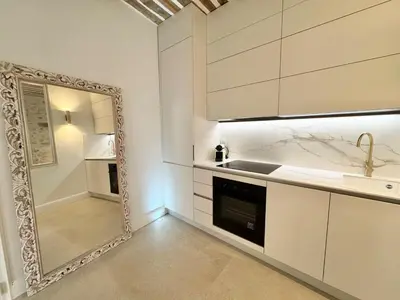 Cuisine ou kitchenette dans l'établissement Luxe et Charme sur les Remparts du Vieil Antibes