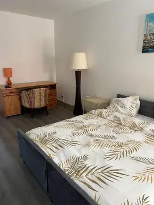 Un ou plusieurs lits dans un hébergement de l'établissement appartement 3 pieces 2 chambres centre ville