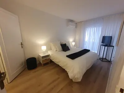 Un ou plusieurs lits dans un hébergement de l'établissement Appartement 2 pièces carré d or Les Floralies