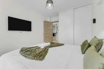 Un ou plusieurs lits dans un hébergement de l'établissement 2 chambres Martinez