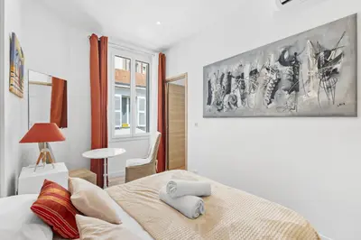 Un ou plusieurs lits dans un hébergement de l'établissement 1 chambres , 131 rue d'antibes