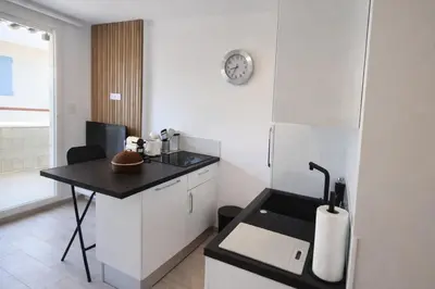 Cuisine ou kitchenette dans l'établissement Juan Signature