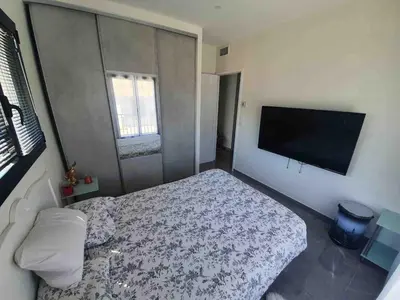 Un ou plusieurs lits dans un hébergement de l'établissement Villa Piscine-Jacuzzi
