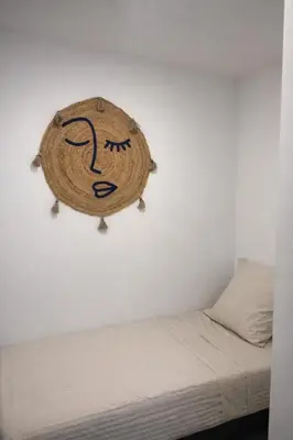 Un ou plusieurs lits dans un hébergement de l'établissement Grand studio cosy avec cinéma - Plage & vieil Antibes à pied