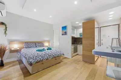 Un ou plusieurs lits dans un hébergement de l'établissement Le Vauban Antibois - Studio avec jolie balcon