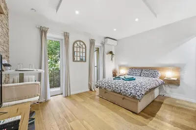 Un ou plusieurs lits dans un hébergement de l'établissement Le Vauban Antibois - Studio avec jolie balcon