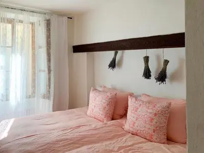 Un ou plusieurs lits dans un hébergement de l'établissement Le Karlstrom - Charmante maison au coeur du Viel Antibes