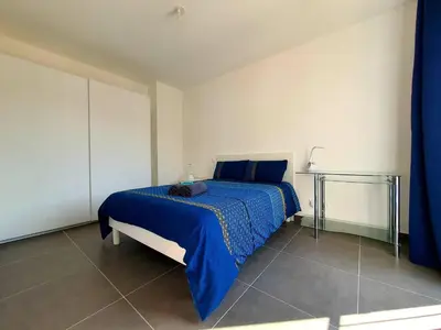 Un ou plusieurs lits dans un hébergement de l'établissement Le Marenda - Appartement au coeur d'Antibes