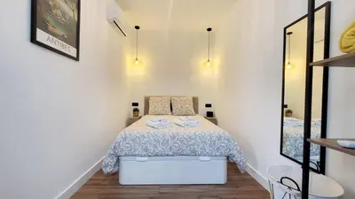 Un ou plusieurs lits dans un hébergement de l'établissement Le Nimentina - Appartement dans le vieil Antibes