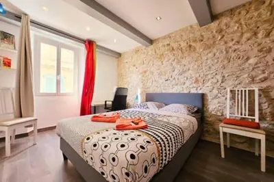 Un ou plusieurs lits dans un hébergement de l'établissement Le Godart - Au coeur du Vieil Antibes