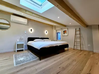 Un ou plusieurs lits dans un hébergement de l'établissement Le Magnum Riviera - Maison Proche de la Plage
