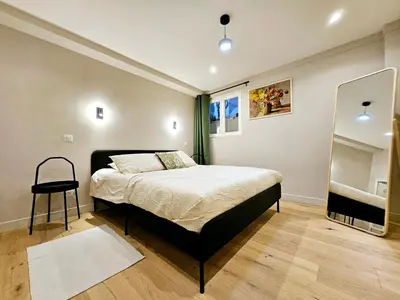 Un ou plusieurs lits dans un hébergement de l'établissement Le Magnum Riviera - Maison Proche de la Plage