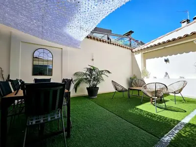 Jardin de l'établissement Le Thuret Fleuri - T3 avec Terrasse