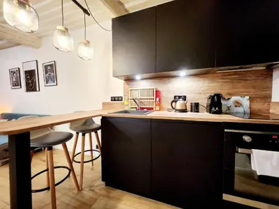 Cuisine ou kitchenette dans l'établissement Le Garino - moins d'un km de la plage