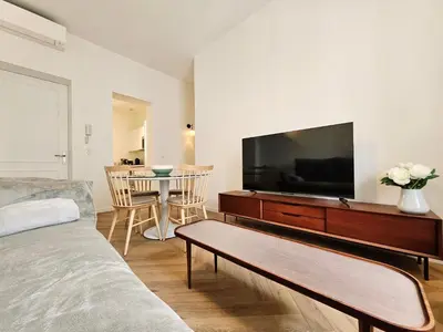 Télévision ou salle de divertissement dans l'établissement Le De Gaulle 1er - En plein centre ville