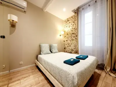 Un ou plusieurs lits dans un hébergement de l'établissement Le Sade 1er et Le Sade 2nd - 2 Appartements au coeur d'Antibes