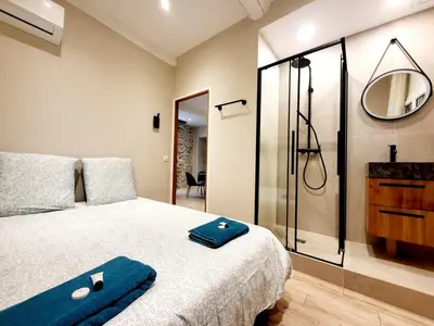 Un ou plusieurs lits dans un hébergement de l'établissement Le Sade 1er et Le Sade 2nd - 2 Appartements au coeur d'Antibes