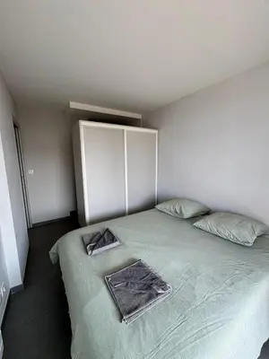 Un ou plusieurs lits dans un hébergement de l'établissement Superbe appartement vue mer garage privatif ferme