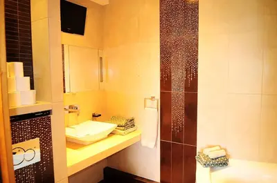 Salle de bains dans l'établissement Marina Beach