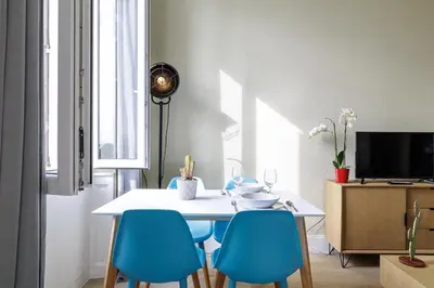 Télévision ou salle de divertissement dans l'établissement Une Parenthèse à la Mer