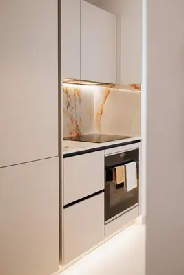 Cuisine ou kitchenette dans l'établissement 2 Appartements porte à porte Groupe & famille
