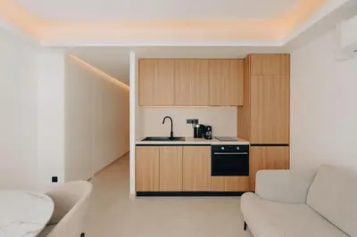 Cuisine ou kitchenette dans l'établissement 2 Appartements porte à porte Groupe & famille