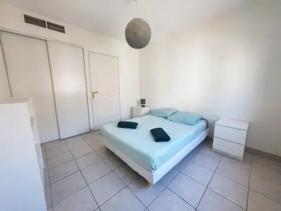 Un ou plusieurs lits dans un hébergement de l'établissement Plage de Juan Les Pins - Apartment with Air conditioner