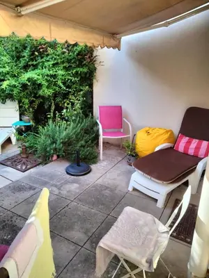 Coin salon dans l'établissement Near Croisette atypic studio garden pool