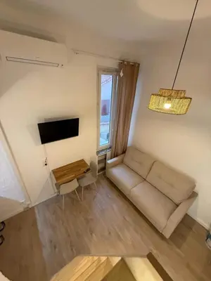 Coin salon dans l'établissement Juan Les Pins Centre, 3-person studio with mezzanine