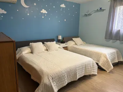 Un ou plusieurs lits dans un hébergement de l'établissement Family Villa SMB