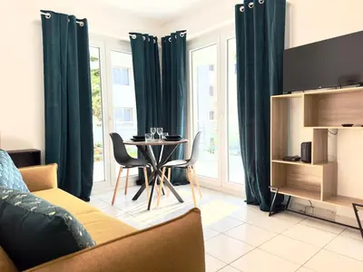Coin salon dans l'établissement Cocon 2 pers à 100m des plages