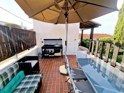 Coin salon dans l'établissement Appartement, terrasse plage, Mmm