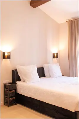 Un ou plusieurs lits dans un hébergement de l'établissement Hotel Villa Botanica