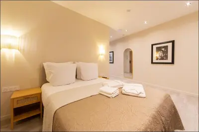 Un ou plusieurs lits dans un hébergement de l'établissement Hotel Villa Botanica