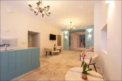 Télévision ou salle de divertissement dans l'établissement Hotel Villa Botanica