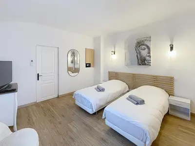 Un ou plusieurs lits dans un hébergement de l'établissement Duplex Cosy Viel Antibes