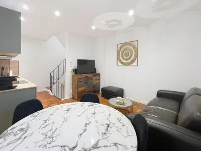 Coin salon dans l'établissement Duplex Cosy Viel Antibes