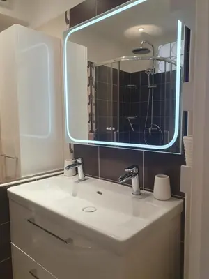 Salle de bains dans l'établissement Le Versailles appartement 4 prs cosy carre d or